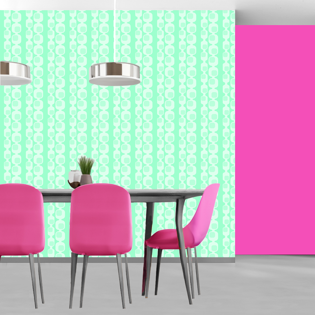 The artwork features a repeating geometric pattern of symmetrical shapes resembling elongated, curved diamonds or petals in various shades of blue and green. Each shape is split vertically with one half filled with a light blue and the other half filled with green or darker blue. The background is a light, almost pastel blue, which provides a soft yet vibrant backdrop. One of the blue shapes near the upper left contains a white starburst element, adding a focal point of brightness to the composition. The overall design conveys a modern, mid-century aesthetic with clean lines and harmonious color contrasts.
